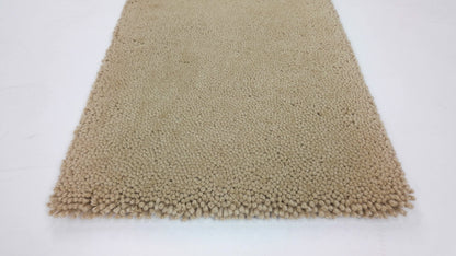 Vloerkleed MOMO Rugs Opus Plain Camel